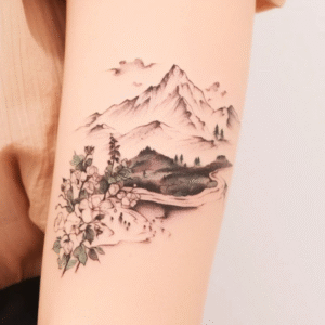 nature inspired tattoo ideas mountain and floral landscape design on arm