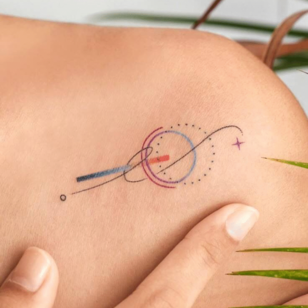 Abstract geometric tattoo with colorful fine line elements symbolizing balance and energy – tattoo symbolism in pop culture