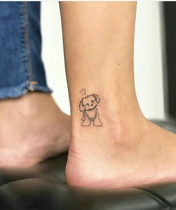 cute minimalist puppy outline tattoo with small heart on ankle