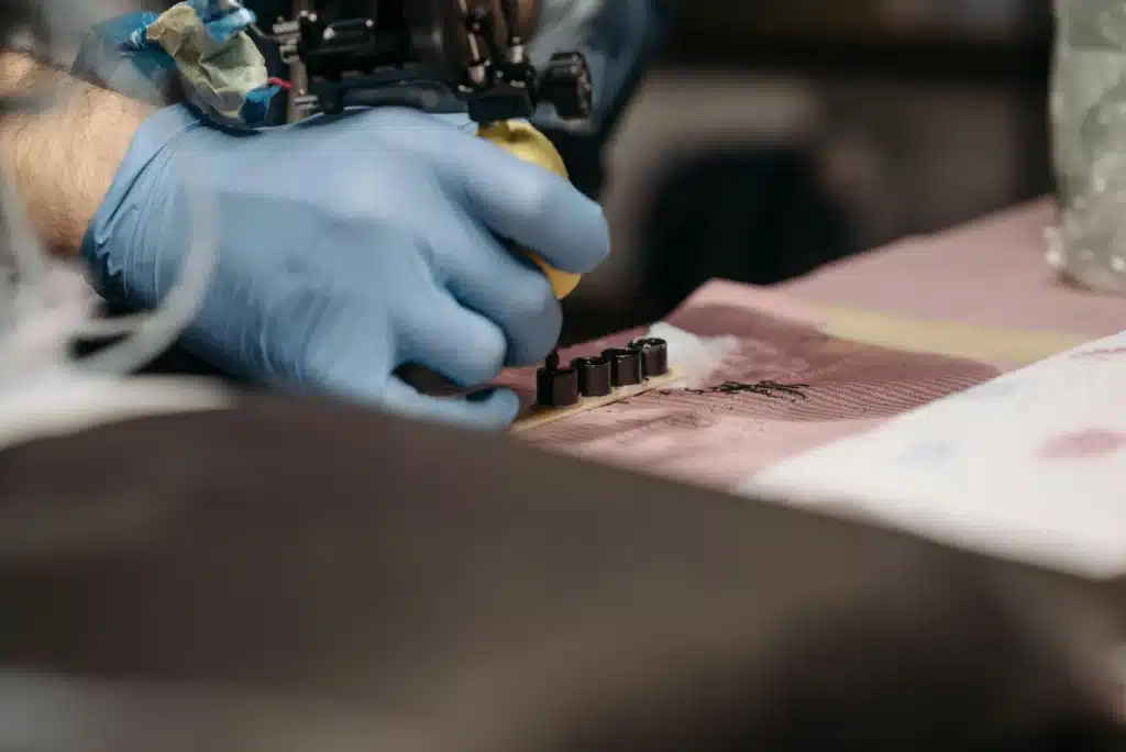 Taxes and tattoos concept showing tattoo ink and sterilized equipment prepared for studio use